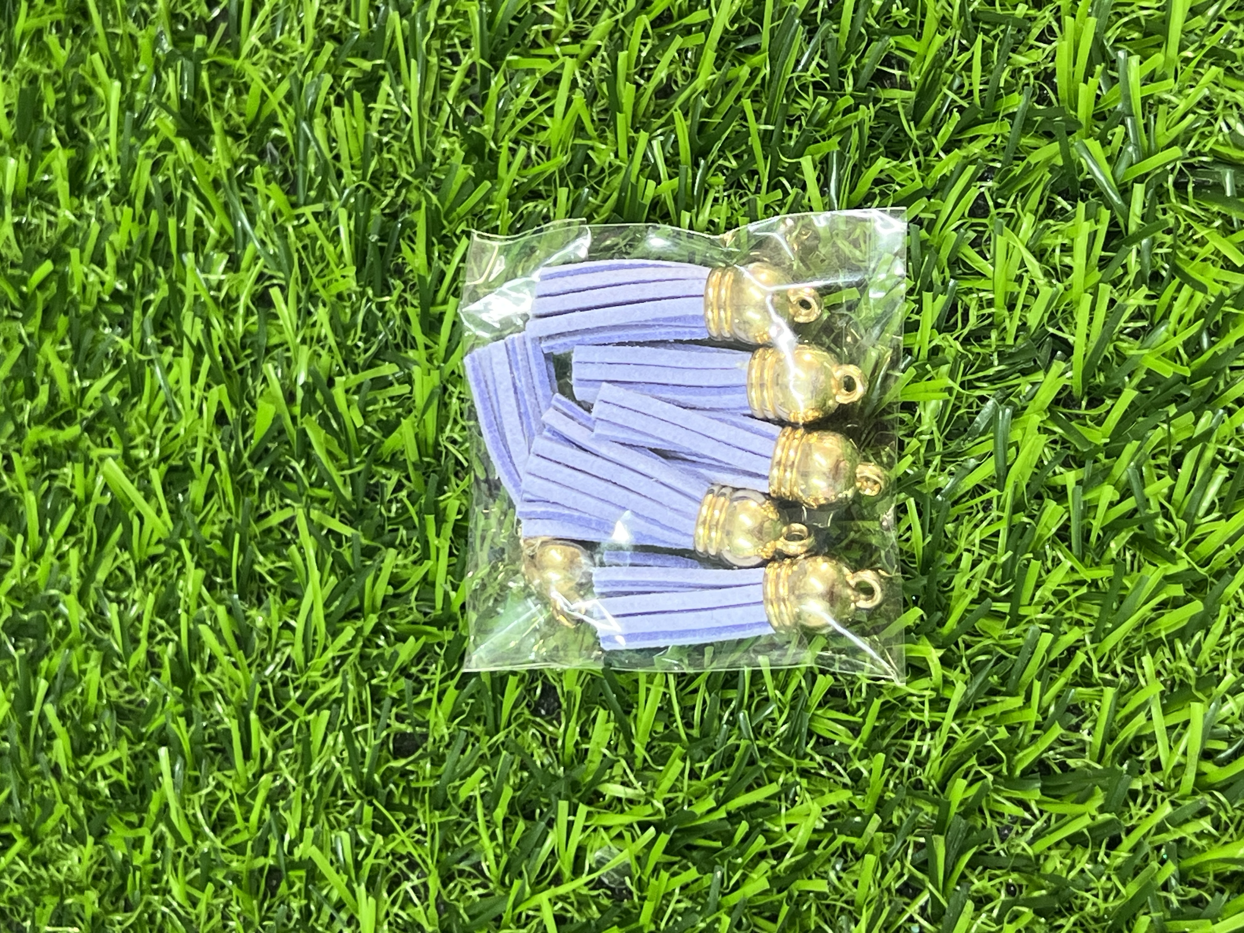 Borlas De Cuerina Tapa Dorada Color Lila