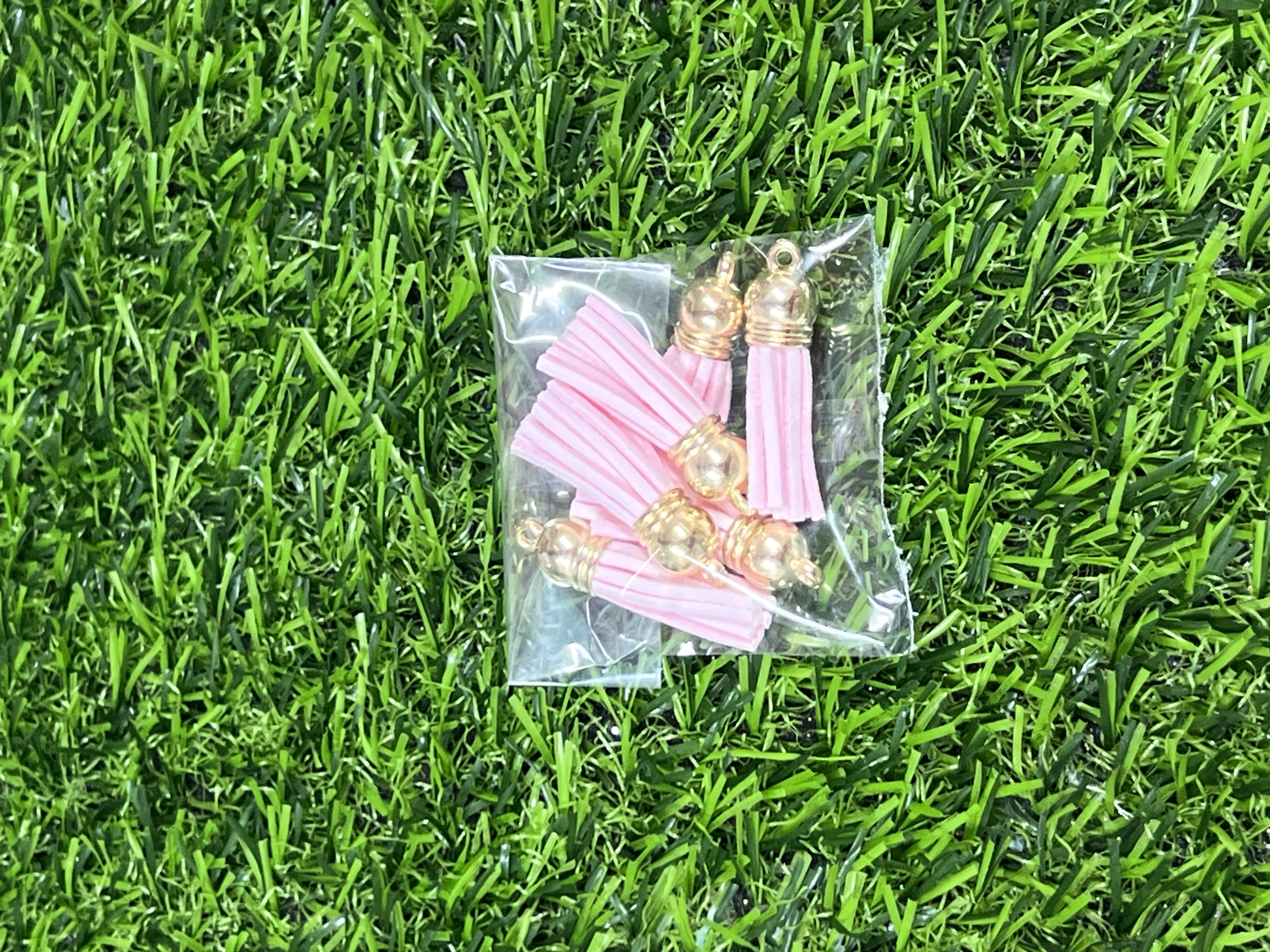 Borlas De Cuerina Tapa Dorada Color Rosado Bebe