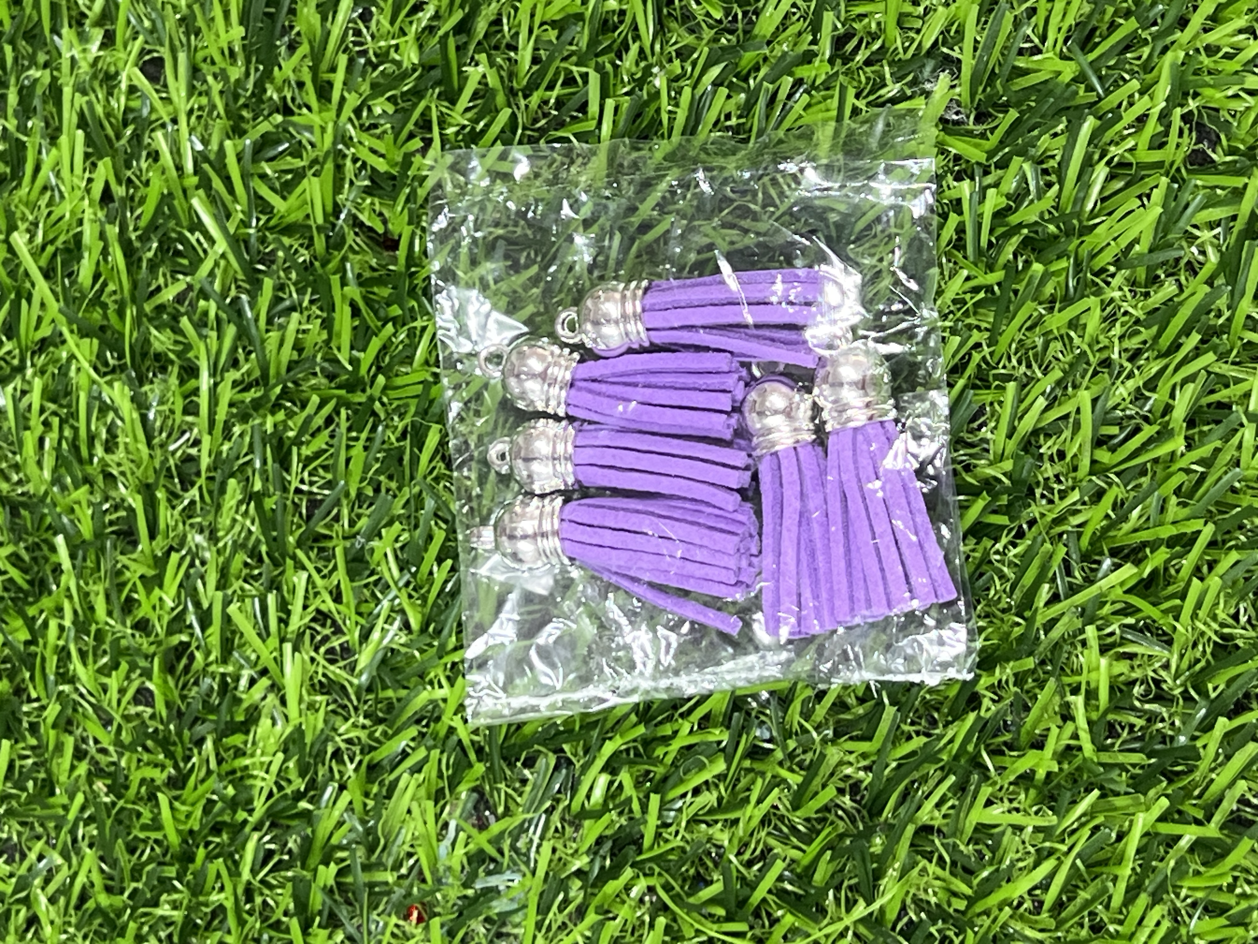 Borlas De Cuerina Tapa Plateada Color Moradas