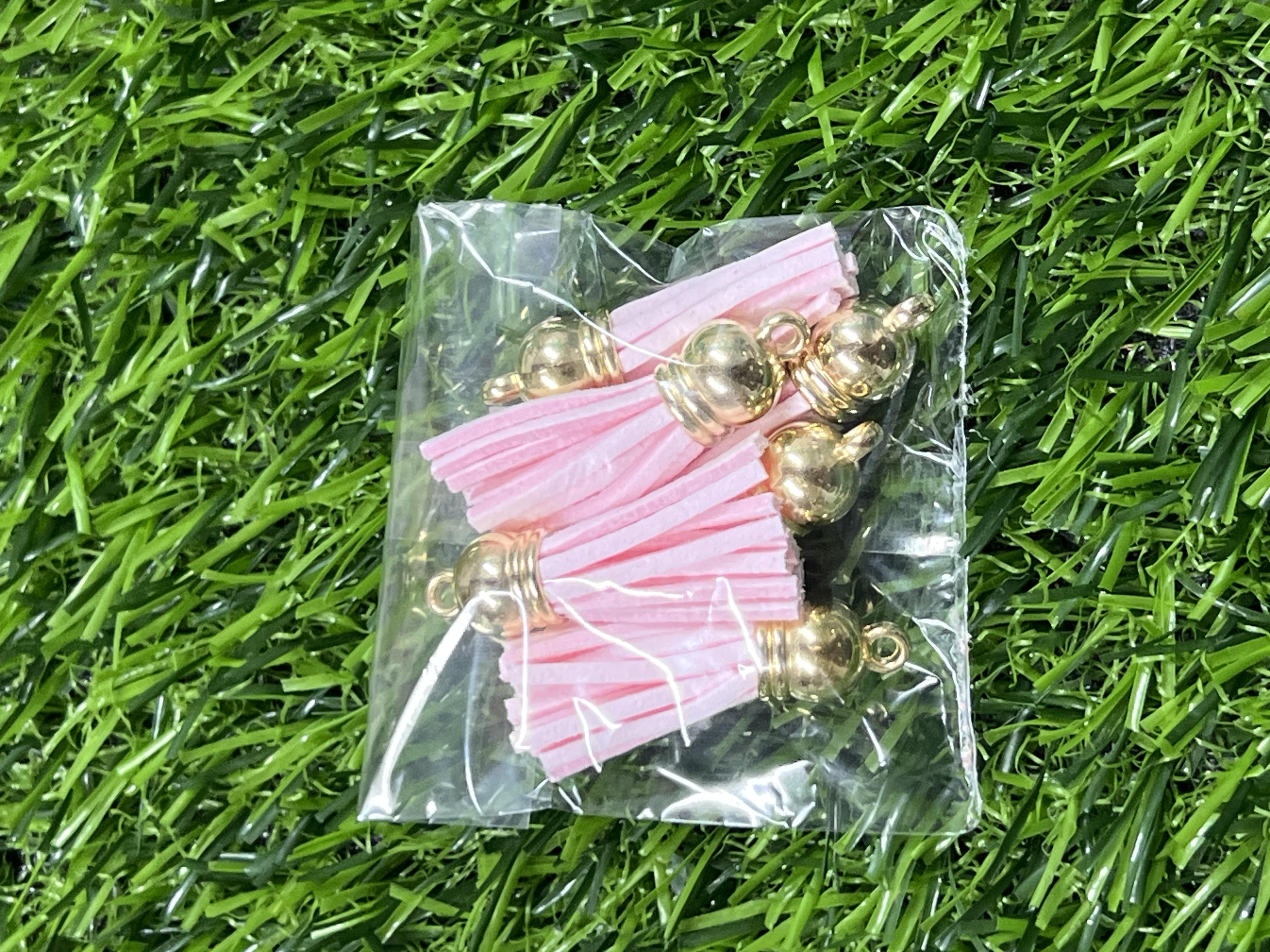 Borlas Cuerina Tapa Dorada Color Rosado Bebe