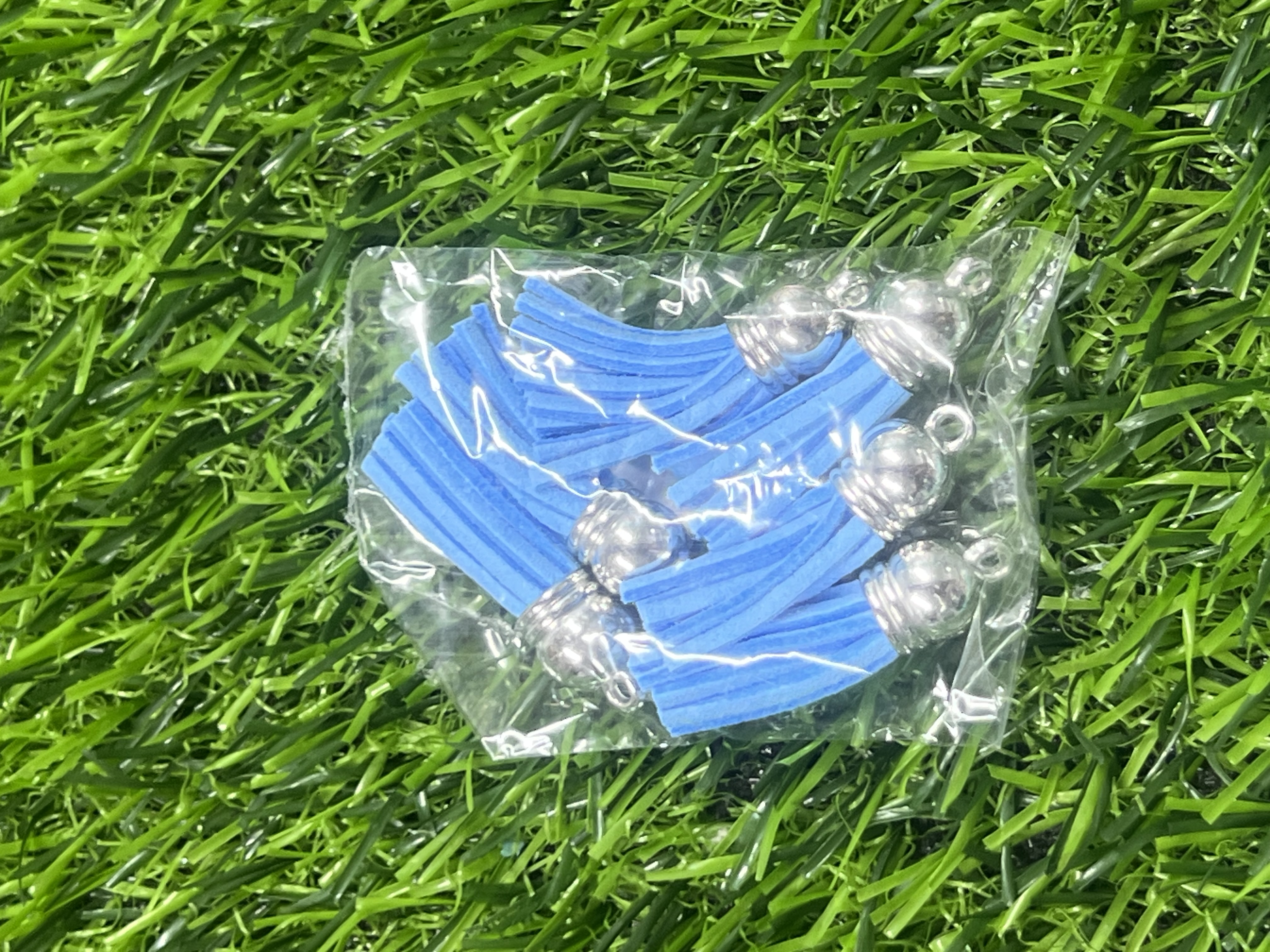 Borlas Cuerina Tapa Plateada Color Azul Celeste 